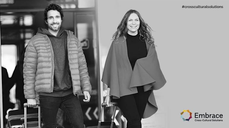 When a man accompanies a woman on an international move.